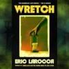 Book cover for Wretch by Eric LaRocca. Set against a gritty, textured black background, the cover features a central, polaroid-style image with a yellowish-green tint. Background gradient changes vertically from green to dark blue to green.